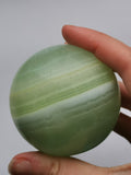 Pistachio calcite sphere